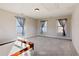 Spacious bedroom with plush carpeting and large windows at 2172 Haventree Ct, Lawrenceville, GA 30043