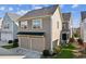 Charming home showcasing a two-car garage and well-manicured lawn at 2172 Haventree Ct, Lawrenceville, GA 30043