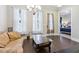 Inviting living room with hardwood floors, neutral walls, and large windows with natural light at 2172 Haventree Ct, Lawrenceville, GA 30043
