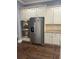 Kitchen with built-in stainless steel appliances and hardwood floors at 227 Shellbark Dr, Mcdonough, GA 30252