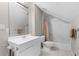 Bathroom featuring vanity sink and a shower with a tan curtain and light walls and floors at 615 Collier Nw Rd, Atlanta, GA 30318