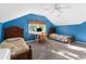 Spacious bedroom with carpeted floors and two beds, features a desk and chair, great for  at 615 Collier Nw Rd, Atlanta, GA 30318