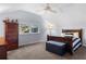 Charming bedroom features light blue walls, carpet, window, and a cozy bed at 615 Collier Nw Rd, Atlanta, GA 30318
