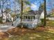 Charming house with a large deck, screened porch, and beautiful landscaping at 615 Collier Nw Rd, Atlanta, GA 30318