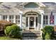 Welcoming entrance featuring a decorative wreath, sidelights, and elegant architectural details at 615 Collier Nw Rd, Atlanta, GA 30318