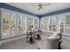 Bright home office with large windows, built-in shelves, and comfortable seating at 615 Collier Nw Rd, Atlanta, GA 30318