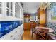 View of the kitchen featuring glass cabinets, wooden countertops, and a breakfast nook at 615 Collier Nw Rd, Atlanta, GA 30318