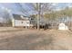 A well-maintained home featuring a large backyard, storage shed, and an inviting outdoor deck at 1195 Braselton Hwy, Lawrenceville, GA 30043