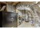 Basement utility area with exposed pipes and a Liberty Safe at 1195 Braselton Hwy, Lawrenceville, GA 30043