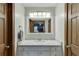 Bathroom with granite countertop vanity and access to the shower and bedroom at 1195 Braselton Hwy, Lawrenceville, GA 30043