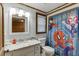 A playful bathroom featuring a Spiderman-themed shower curtain, vanity, and neutral finishes at 1195 Braselton Hwy, Lawrenceville, GA 30043