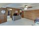 Charming bedroom with wood-paneled walls, leading to a walk-in closet and adjacent rooms at 1195 Braselton Hwy, Lawrenceville, GA 30043