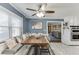 Charming dining area features a built-in bench, a unique wood table, and an adjacent renovated kitchen at 1195 Braselton Hwy, Lawrenceville, GA 30043