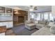 Inviting living room with brick fireplace, built-in shelves, and comfortable seating arrangement at 1195 Braselton Hwy, Lawrenceville, GA 30043