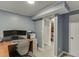 Office with modern L-shaped desk, multiple monitors, and sleek décor at 1195 Braselton Hwy, Lawrenceville, GA 30043