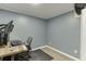 Office space with grey walls, wood-look flooring and a desk setup at 1195 Braselton Hwy, Lawrenceville, GA 30043