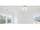Bedroom with a large window and ceiling fan at 3078 Turning Creek Trl, Dacula, GA 30019