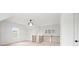 Upstairs bonus room with natural light and custom chandelier at 3078 Turning Creek Trl, Dacula, GA 30019