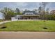 Charming two-story home featuring a brick-and-white facade, covered porch, and a spacious three-car garage at 3078 Turning Creek Trl, Dacula, GA 30019