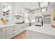 Bright and airy kitchen with stainless appliances, subway tile backsplash, and marble countertops at 3078 Turning Creek Trl, Dacula, GA 30019