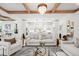 Open living space with kitchen, dining and living areas, and modern decor at 3078 Turning Creek Trl, Dacula, GA 30019