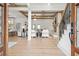 Open floor plan with a grand fireplace, hardwood floors, and stylish decor at 3078 Turning Creek Trl, Dacula, GA 30019