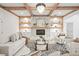 Stylish living room with hardwood floors, fireplace, and built-in shelves at 3078 Turning Creek Trl, Dacula, GA 30019