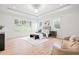 Bright main bedroom boasts large windows, tray ceilings, and modern decor for a peaceful retreat at 3078 Turning Creek Trl, Dacula, GA 30019