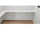 Mudroom with L-shaped white bench at 3078 Turning Creek Trl, Dacula, GA 30019