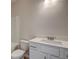 Bathroom vanity with a quartz countertop, modern faucet, and toilet, offering both style and functionality at 412 Westmarch Cir, Loganville, GA 30052