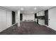 Large basement with an entertainment area and wet bar, offering ample space for recreation and relaxation at 450 Birkdale Dr, Fayetteville, GA 30215