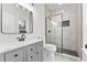 Modern bathroom featuring a new vanity, sleek fixtures and stand-up shower at 450 Birkdale Dr, Fayetteville, GA 30215