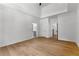 Bright bedroom with hardwood floors featuring an ensuite bathroom and walk in closets at 450 Birkdale Dr, Fayetteville, GA 30215
