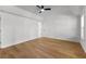 Bright bedroom with lots of natural light, neutral walls, and wood flooring at 450 Birkdale Dr, Fayetteville, GA 30215