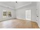 Large bedroom featuring trey ceilings, hardwood floors and natural light at 450 Birkdale Dr, Fayetteville, GA 30215