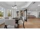 Dining area with outdoor views and access to the patio at 450 Birkdale Dr, Fayetteville, GA 30215