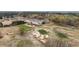 Aerial view of a well-maintained golf course with sand traps and putting greens at 450 Birkdale Dr, Fayetteville, GA 30215