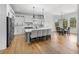 Spacious kitchen and dining area with stainless steel appliances and a large center island at 450 Birkdale Dr, Fayetteville, GA 30215