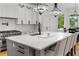 Kitchen island featuring quartz counters, seating for four and high-end stainless appliances at 450 Birkdale Dr, Fayetteville, GA 30215