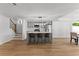 Open kitchen featuring an island with barstool seating and stainless steel appliances at 450 Birkdale Dr, Fayetteville, GA 30215