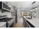 Spacious kitchen featuring stainless steel appliances and center island with seating at 450 Birkdale Dr, Fayetteville, GA 30215