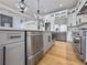 Contemporary kitchen with stainless steel appliances, lots of counter space and modern fixtures at 450 Birkdale Dr, Fayetteville, GA 30215