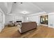 Spacious living room with a fireplace and plush seating for comfortable relaxation at 450 Birkdale Dr, Fayetteville, GA 30215