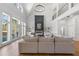 Bright open floorplan living room with fireplace, staircase and view of the second floor balcony at 450 Birkdale Dr, Fayetteville, GA 30215