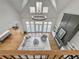 Aerial view of stunning living room with fireplace, high ceilings and plenty of seating at 450 Birkdale Dr, Fayetteville, GA 30215