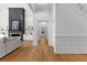 Living room features a decorative fireplace, built-ins, and an open concept design at 450 Birkdale Dr, Fayetteville, GA 30215