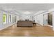 Large living room with lots of windows, a fireplace, and access to the outdoors at 450 Birkdale Dr, Fayetteville, GA 30215