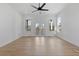 Bright living room with hardwood floors and large windows, providing lots of natural light at 450 Birkdale Dr, Fayetteville, GA 30215