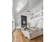 Bright open floorplan living room with fireplace and view of second floor balcony at 450 Birkdale Dr, Fayetteville, GA 30215
