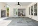 Spacious covered patio with slate flooring, fireplace, and access to the backyard at 48 25Th St, Atlanta, GA 30309